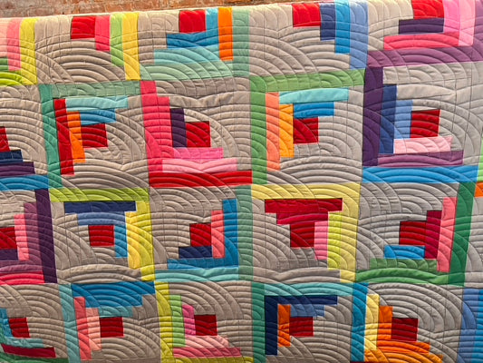 Custom Log Cabin Quilt Designed and Quilted by: Tabatha Adams (Throw Size)